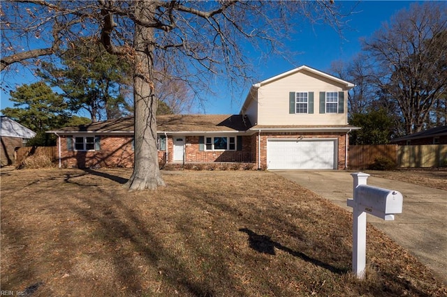 view of front facade with a front lawn and a garage