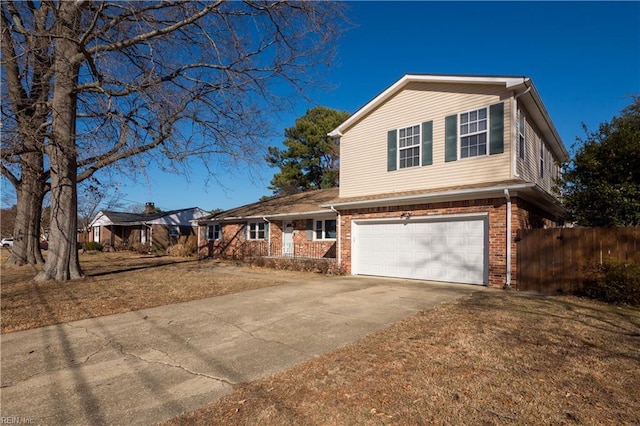 view of front of house with a front lawn and a garage