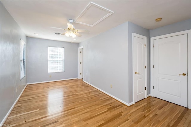 spare room featuring light wood-type flooring