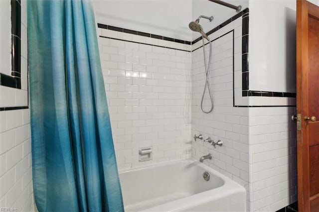 bathroom featuring shower / bath combination with curtain