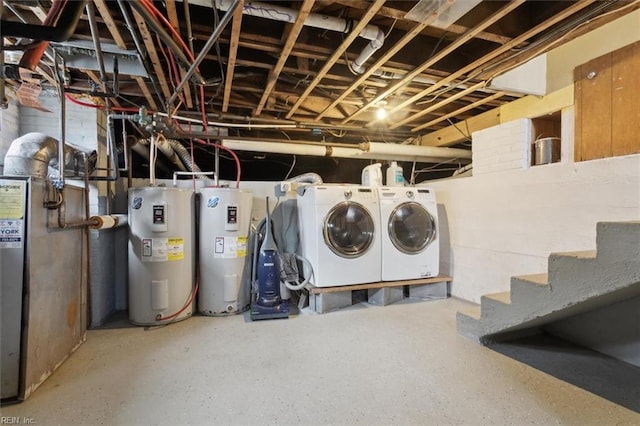 interior space with water heater and washer and dryer