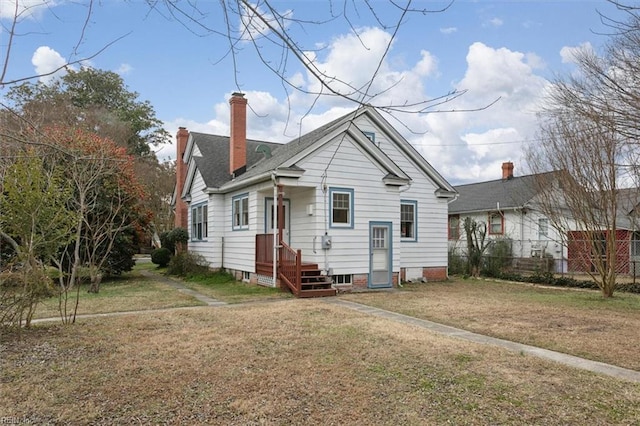 view of front facade featuring a front yard