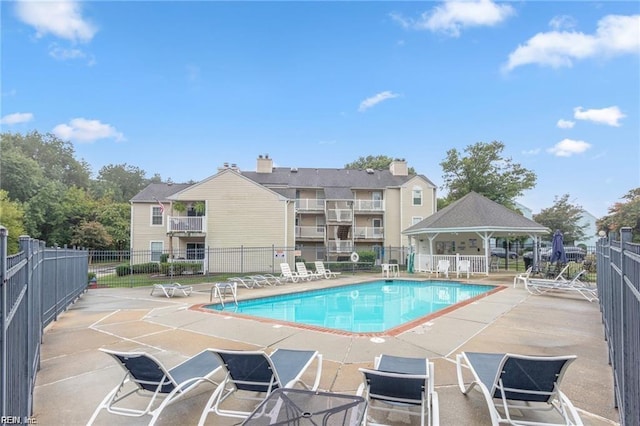 view of pool featuring a patio area and a gazebo