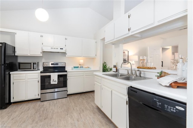 kitchen featuring sink, white cabinetry, and black appliances