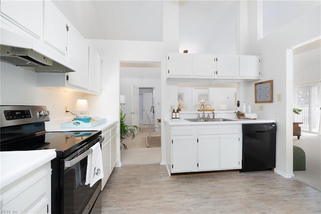 kitchen featuring white cabinetry, a high ceiling, sink, black dishwasher, and stainless steel range with electric cooktop