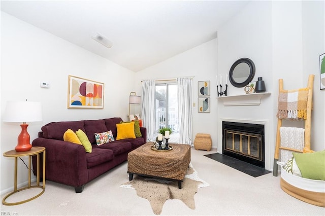 carpeted living room featuring lofted ceiling