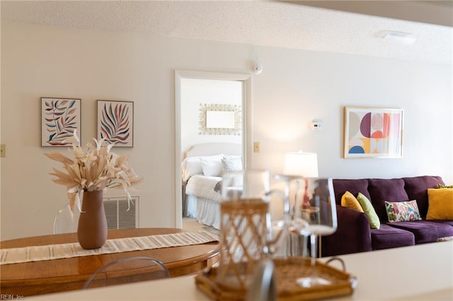 living room featuring a textured ceiling