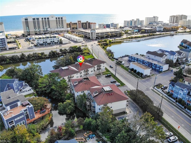 bird's eye view with a water view