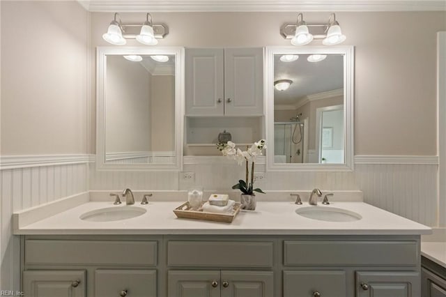 bathroom featuring vanity, walk in shower, and crown molding