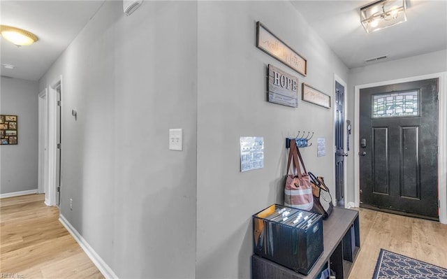 foyer entrance featuring light hardwood / wood-style floors