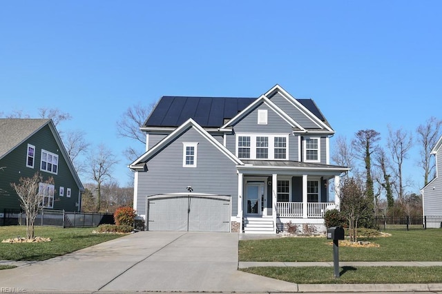 view of front of house featuring a porch, solar panels, a front yard, and a garage