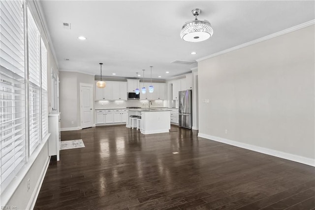 unfurnished living room featuring ornamental molding and dark wood-type flooring