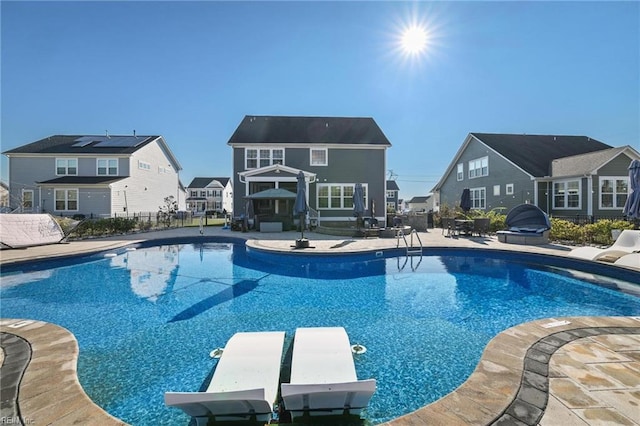 view of pool featuring a patio area