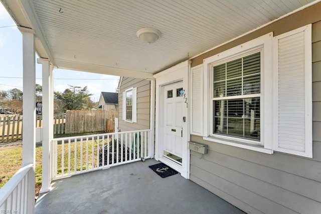 doorway to property with covered porch