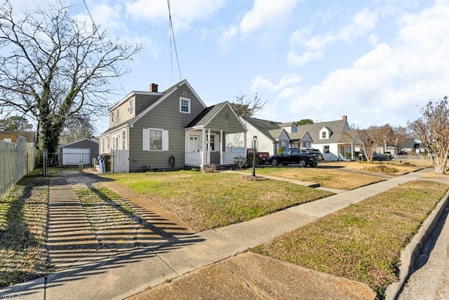 view of front facade featuring a front lawn and a garage