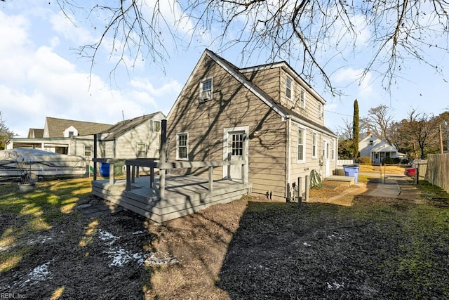 view of side of home featuring a deck