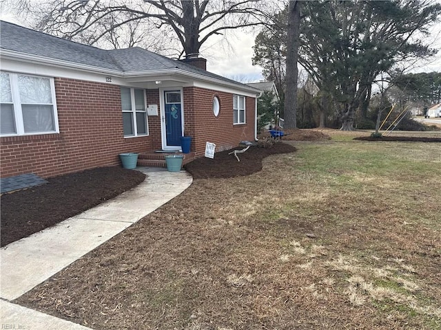 exterior space featuring a yard