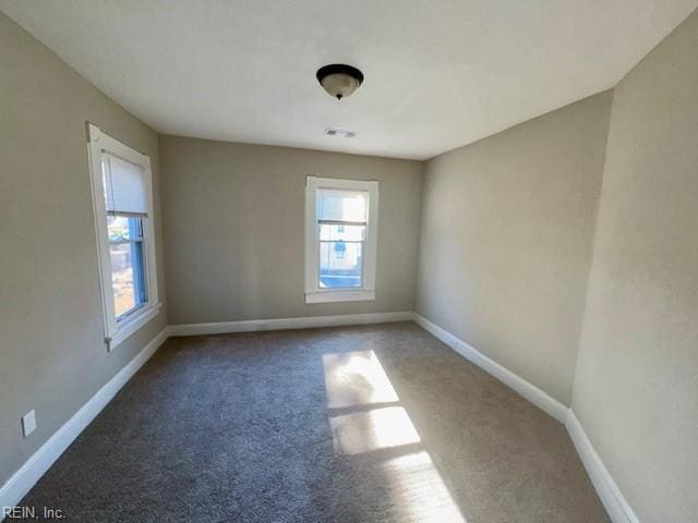 empty room with carpet floors