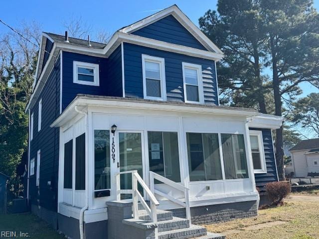 exterior space with a sunroom