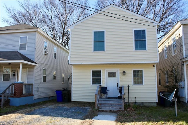 view of front of house featuring cooling unit