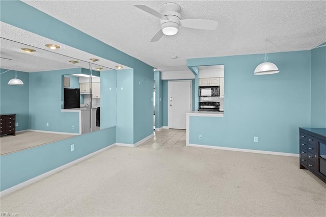 living room featuring light colored carpet, ceiling fan, and a textured ceiling