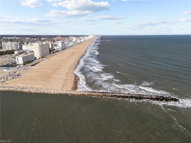 bird's eye view with a beach view and a water view