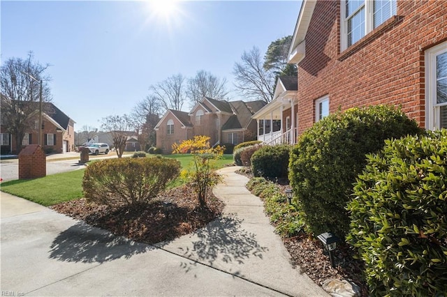 view of property's community with a yard