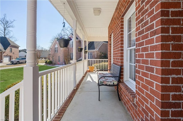 balcony featuring covered porch