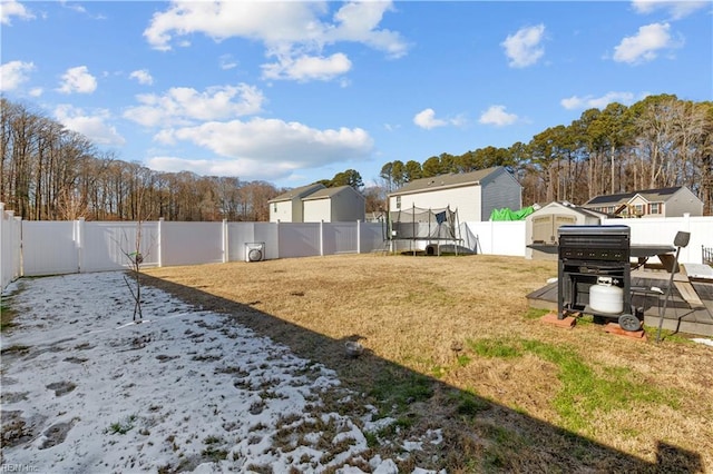 view of yard featuring a trampoline