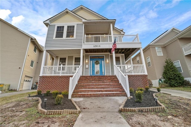 view of front facade featuring a porch and a garage