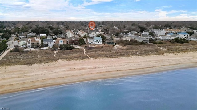 drone / aerial view with a view of the beach and a water view