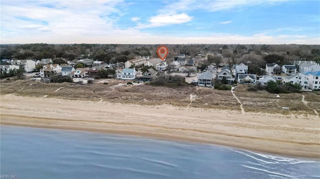 aerial view with a view of the beach and a water view