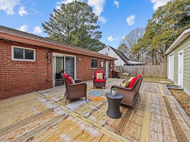 deck featuring outdoor lounge area