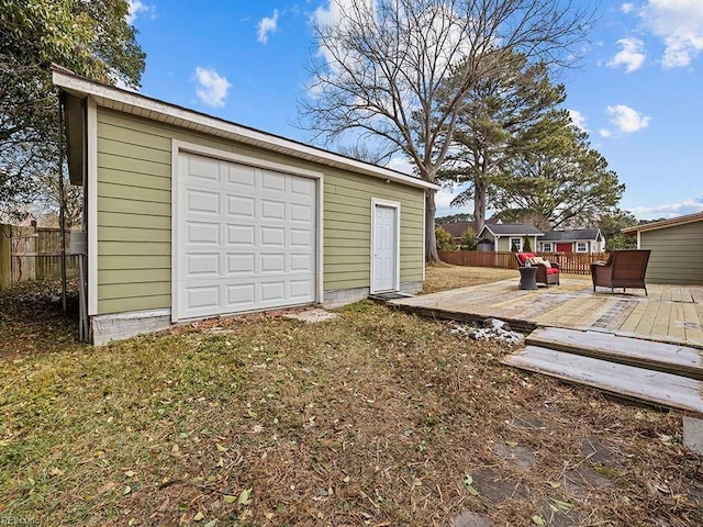 garage with a lawn