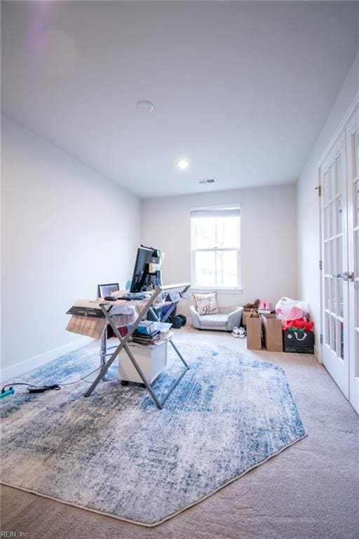 interior space featuring carpet floors and french doors