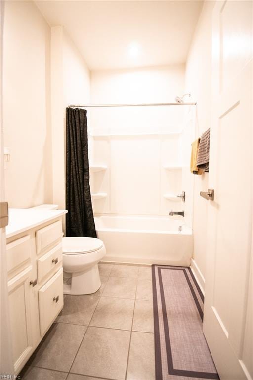 full bathroom with toilet, shower / tub combo, tile patterned floors, and vanity