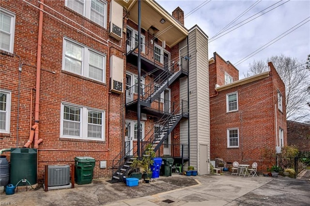 view of property with central air condition unit