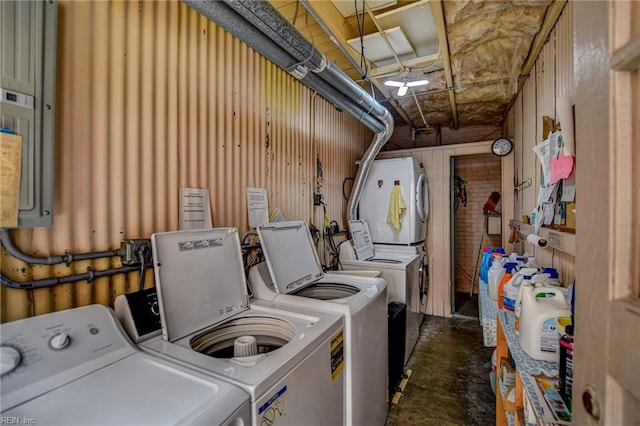 clothes washing area featuring washer and dryer