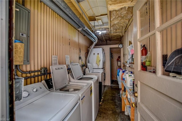 laundry area featuring washing machine and dryer and electric panel