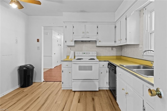 kitchen with white cabinets, white electric stove, black dishwasher, sink, and ceiling fan