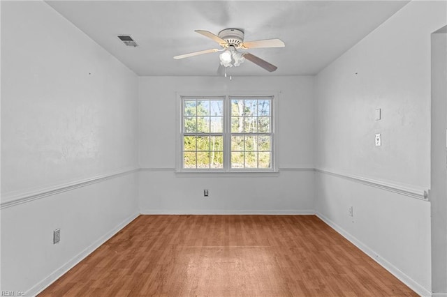 unfurnished room with ceiling fan and light hardwood / wood-style flooring