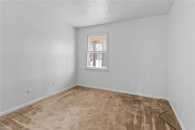 empty room with carpet flooring