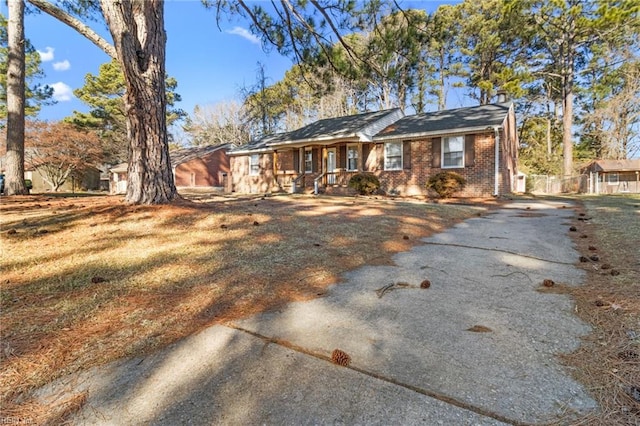 ranch-style house with a front yard