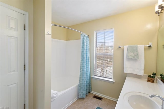 bathroom with shower / bathtub combination with curtain, tile patterned floors, and vanity