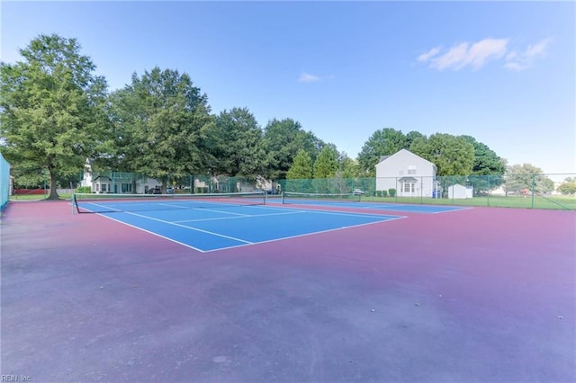 view of tennis court with basketball court