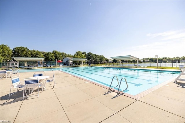 view of pool with a pergola