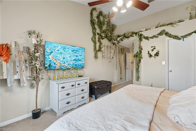 bedroom featuring ceiling fan and light carpet