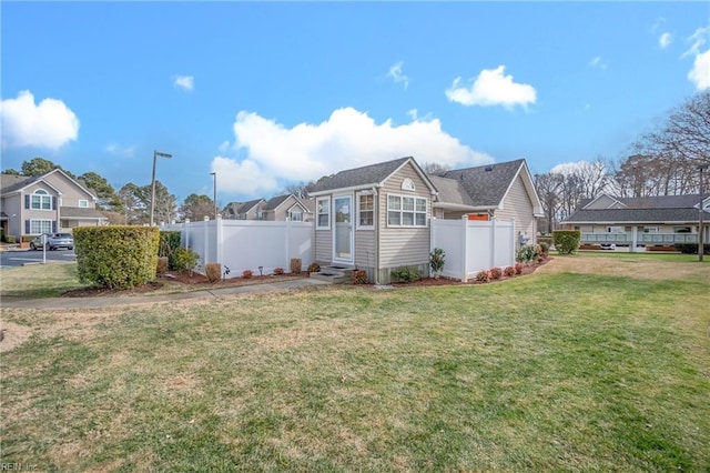 view of home's exterior featuring a lawn