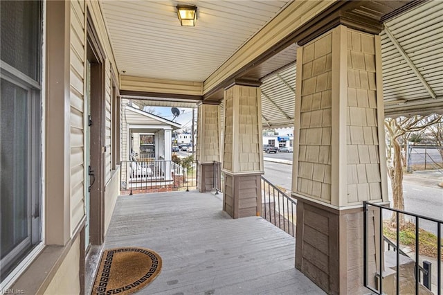 wooden terrace featuring a porch