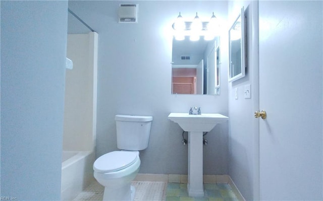 bathroom featuring toilet and tile patterned floors